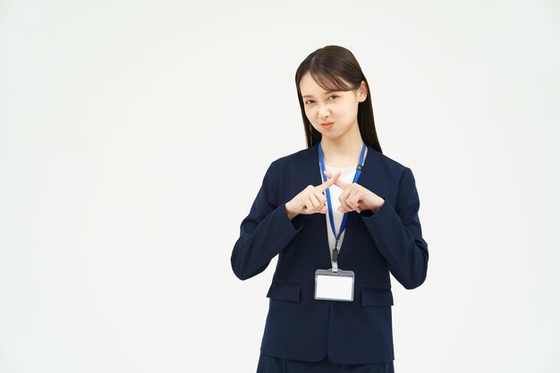 Business woman in a negative pose and white background