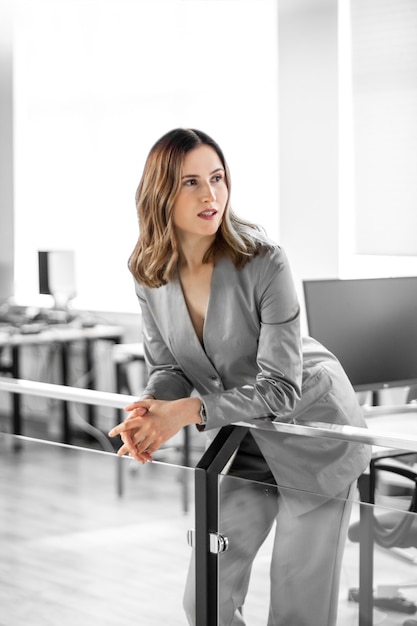business woman in office, woman in suit