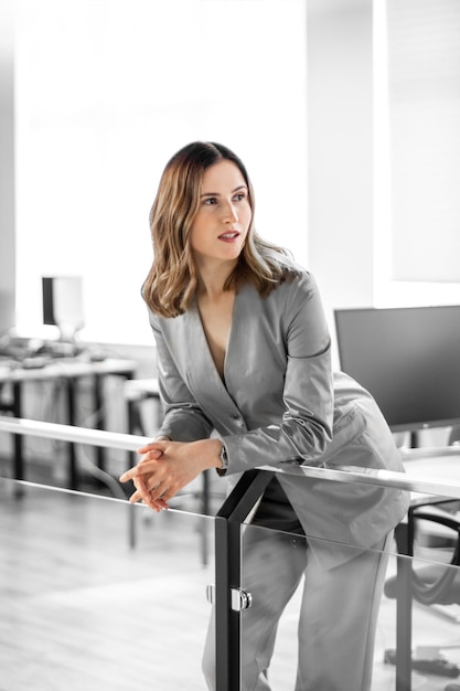 Business woman in office, woman in suit