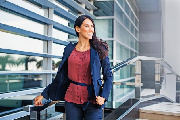 Business woman outside building standing