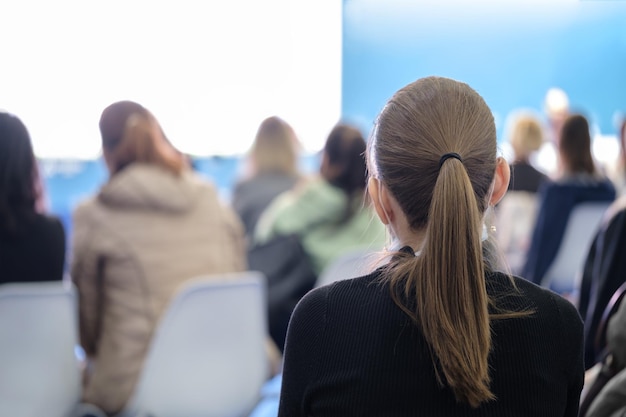 Business woman and people Listening on The Conference Horizontal Image