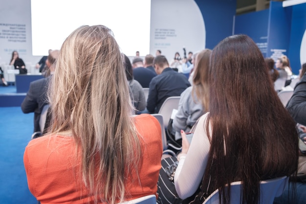 Business woman and people Listening on The Conference Horizontal Image