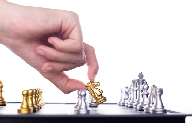 Business woman play Chess to success Leader use strategy game to challenge competitor with intelligence leadership power to move King to victory with management team idea battle to win copy space