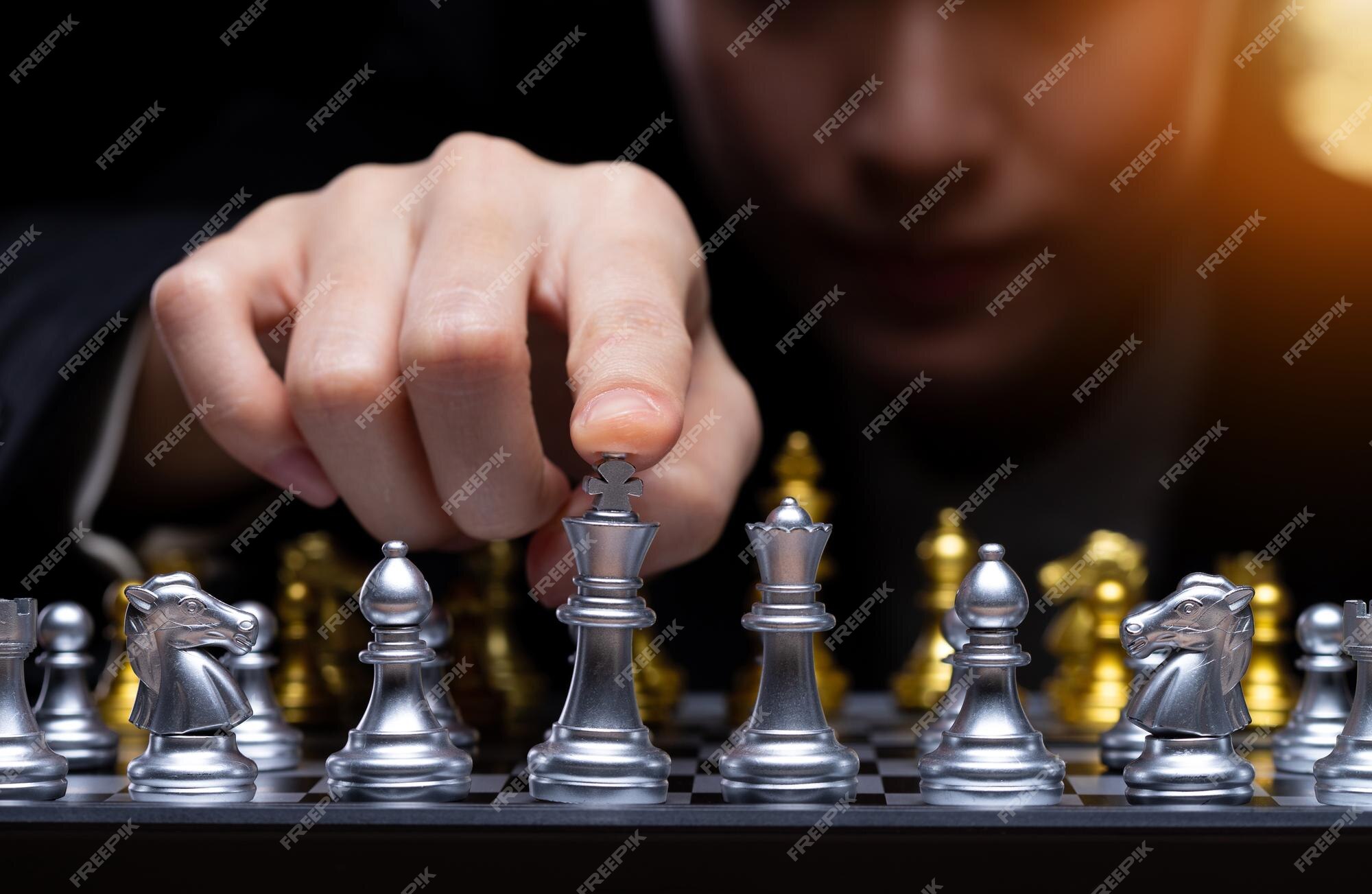 Key Strategy Person Playing Chess And Taking Next Move