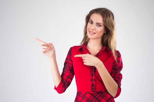 Business woman pointing with her hands