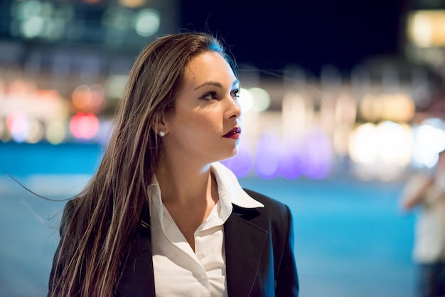 Business woman portrait at night