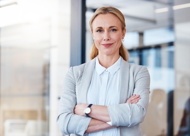 Photo business woman portrait smile and arms crossed in confidence for small business management at the office happy and confident female person manager or ceo in corporate leadership at the workplace