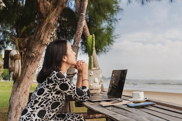 Business woman relaxing breathing fresh air while