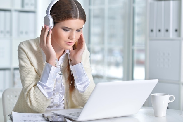 Business woman sitting at table