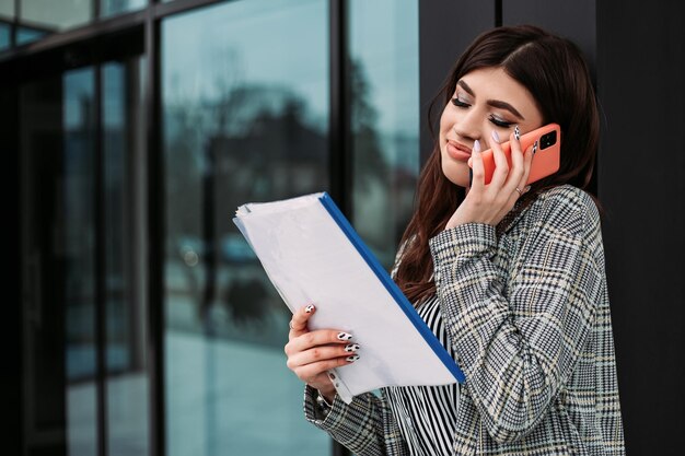 Business woman standing outside