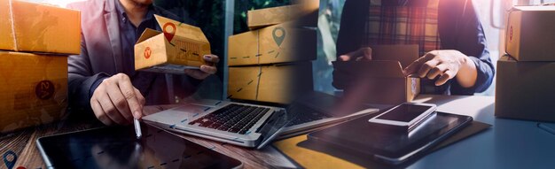 Business woman start up small business entrepreneur SME success freelance woman working at home with Online Parcel delivery SME and packaging deliveryconcept