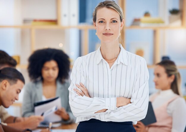 Photo business woman success and startup entrepreneur in a office team meeting feeling proud portrait of a corporate ceo worker and manager ready for teamwork collaboration and staff job planning