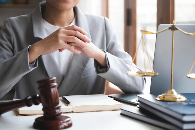 Business woman in suit or lawyer working on a documents