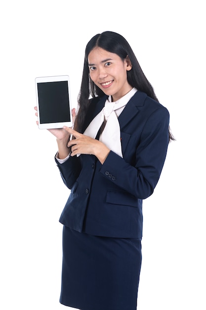 Business woman in a suit using a digital tablet 