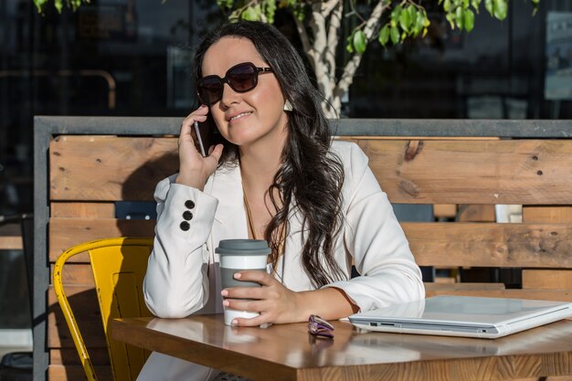 Business woman talking on the phone