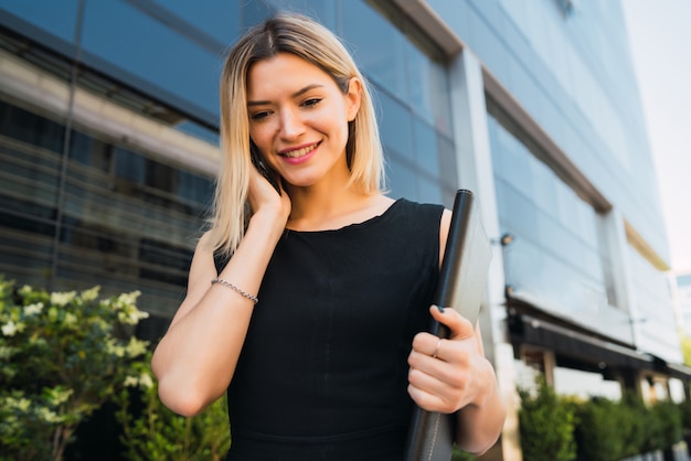 Business woman talking on the phone.