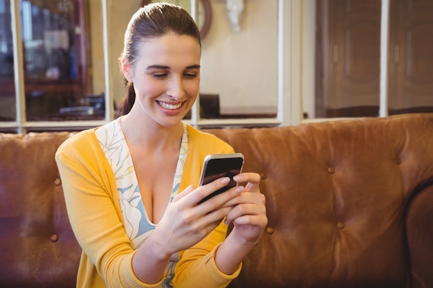 Business woman using her phone