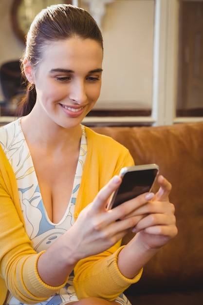 Business woman using her phone