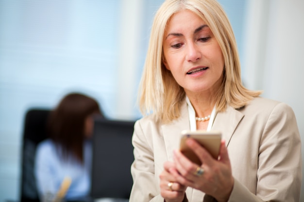 business woman using her smartphone