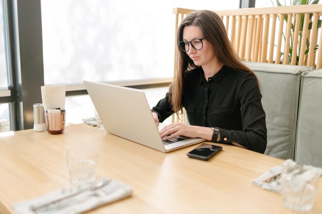 Business woman using laptop