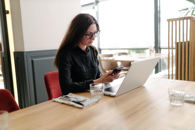 Business woman using laptop