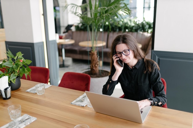 Business woman using laptop