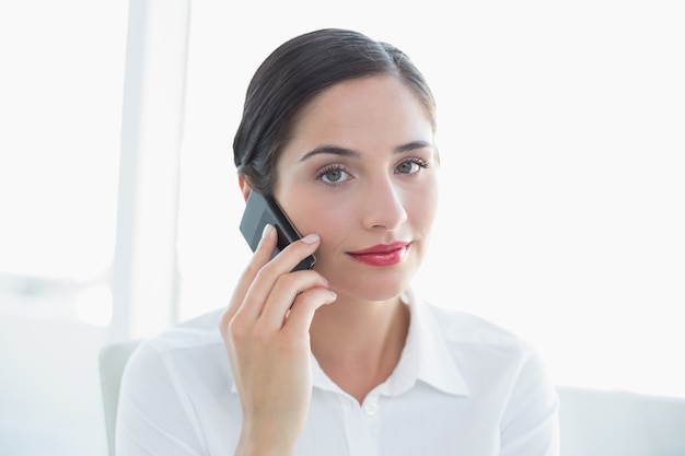 Business woman using mobile phone