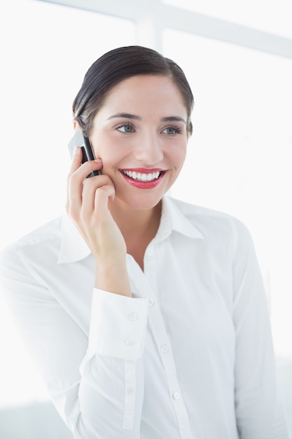 Business woman using mobile phone