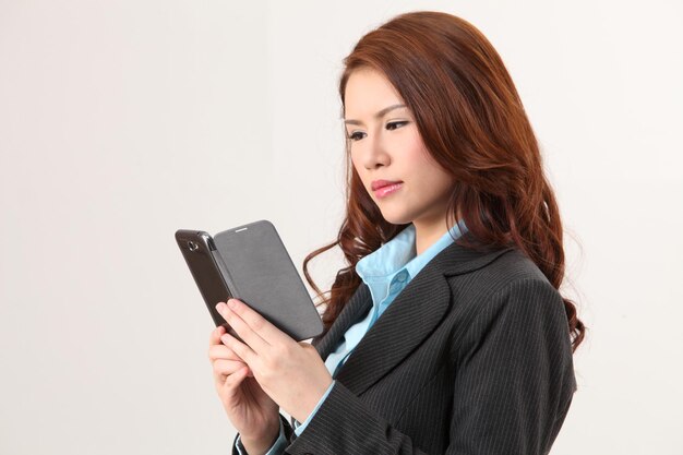 Business woman using mobile phone