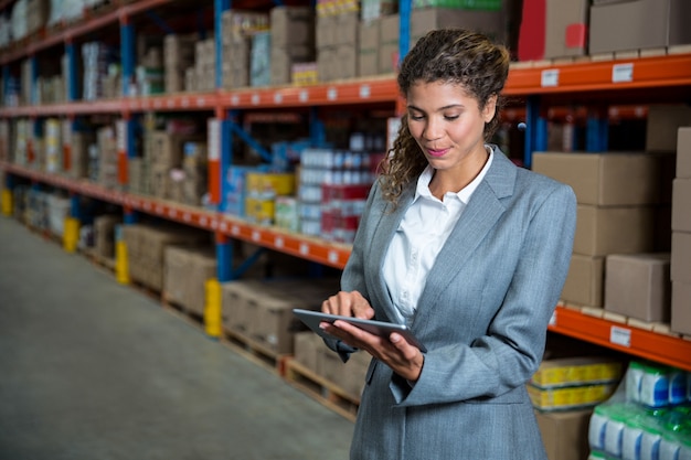 Business woman using tablet