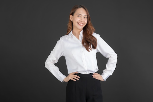 business woman wearing white shirt standing and doing various poses