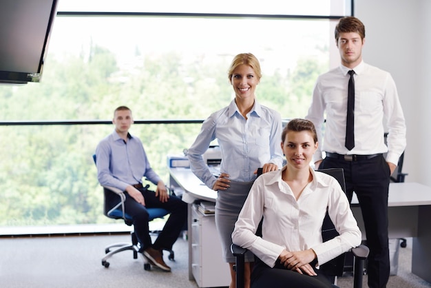 business woman  with her staff,  people group in background at modern bright office indoors