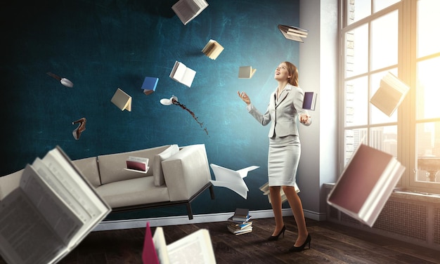 Business woman with papers and books around her. Mixed media