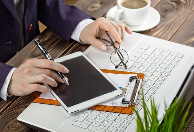 Business woman working in the office with items for doing business