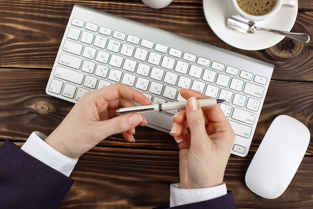 Business woman working in the office with items for doing business