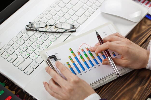 Business woman working in the office with items for doing business