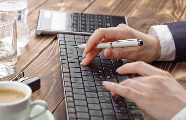 Business woman working in the office with items for doing business