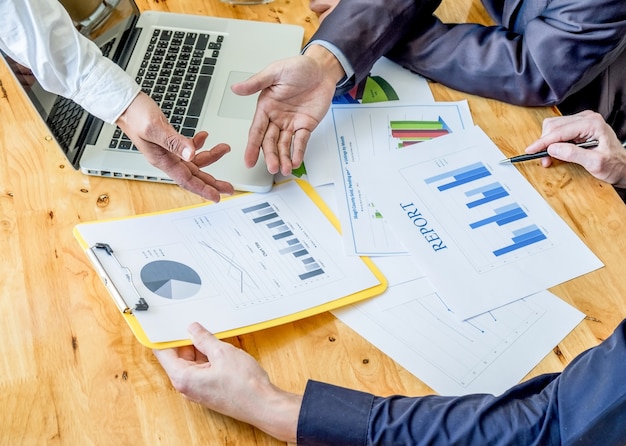 Business woman working at office with laptop and documents on his desk. Business concept.