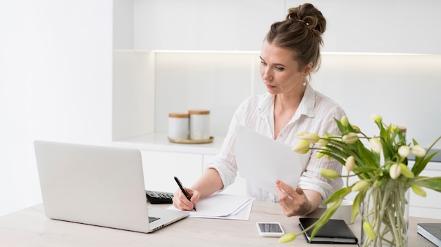 Business woman writing document