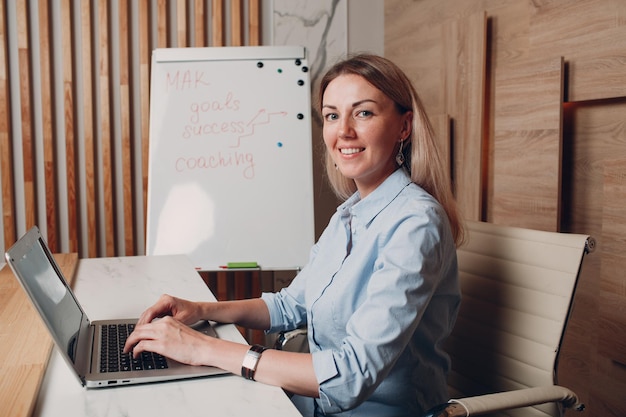 Business woman young adult coach at office