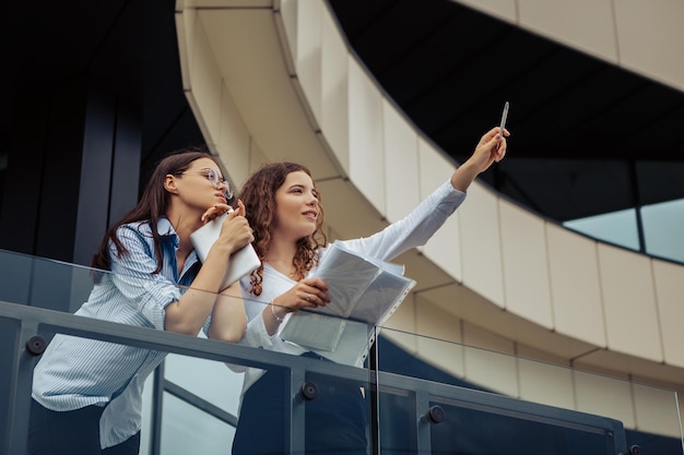 Business women near office building