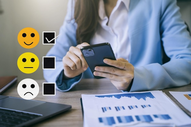 Business women working with smart phone and laptop computer in office with digital marketing media