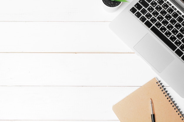 Photo business work place with equipment on wooden desk, top view