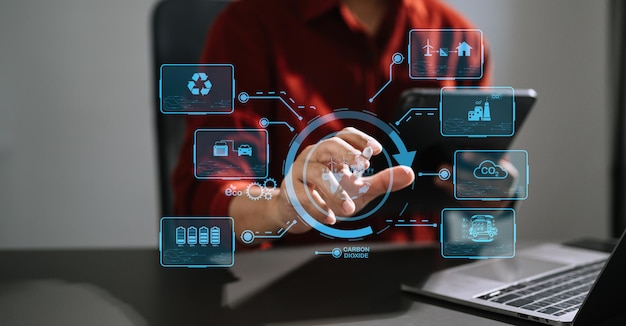 Business working with reduce CO2 concept with icons global warming such as reforest green factory recycle and zero carbon dioxide emission concept with VR icon at officexAxA