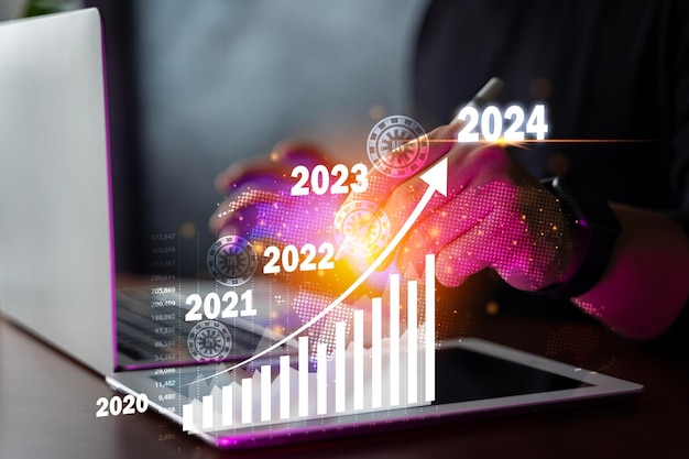 Businessman analyzes profitability of working companies with digital augmented reality graphics positive indicators in 2024