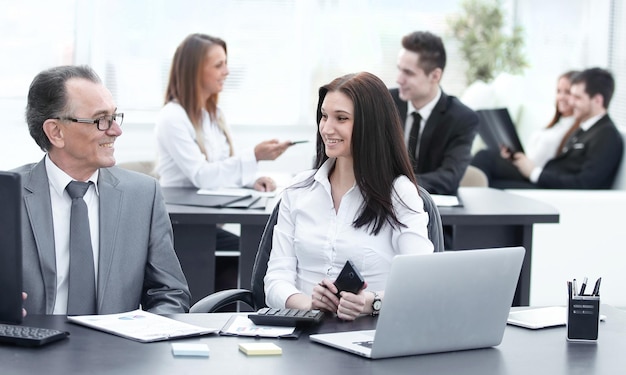 Businessman analyzing investment budget and income charts at his workplace