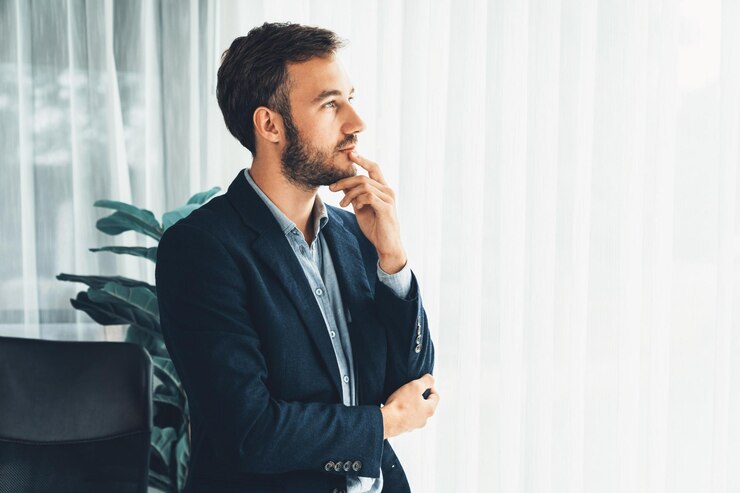 Photo businessman in black suit stand confidently in modern office portrait entity