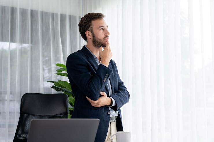 Photo businessman in black suit stand confidently in modern office portrait entity