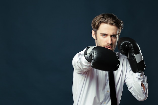 Businessman in boxing gloves