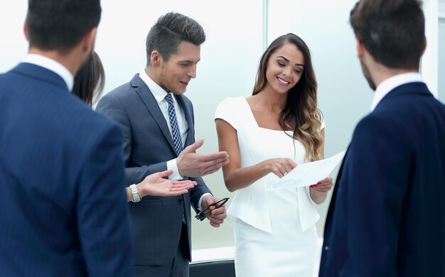 Businessman and business woman discussing working paperbusiness concept